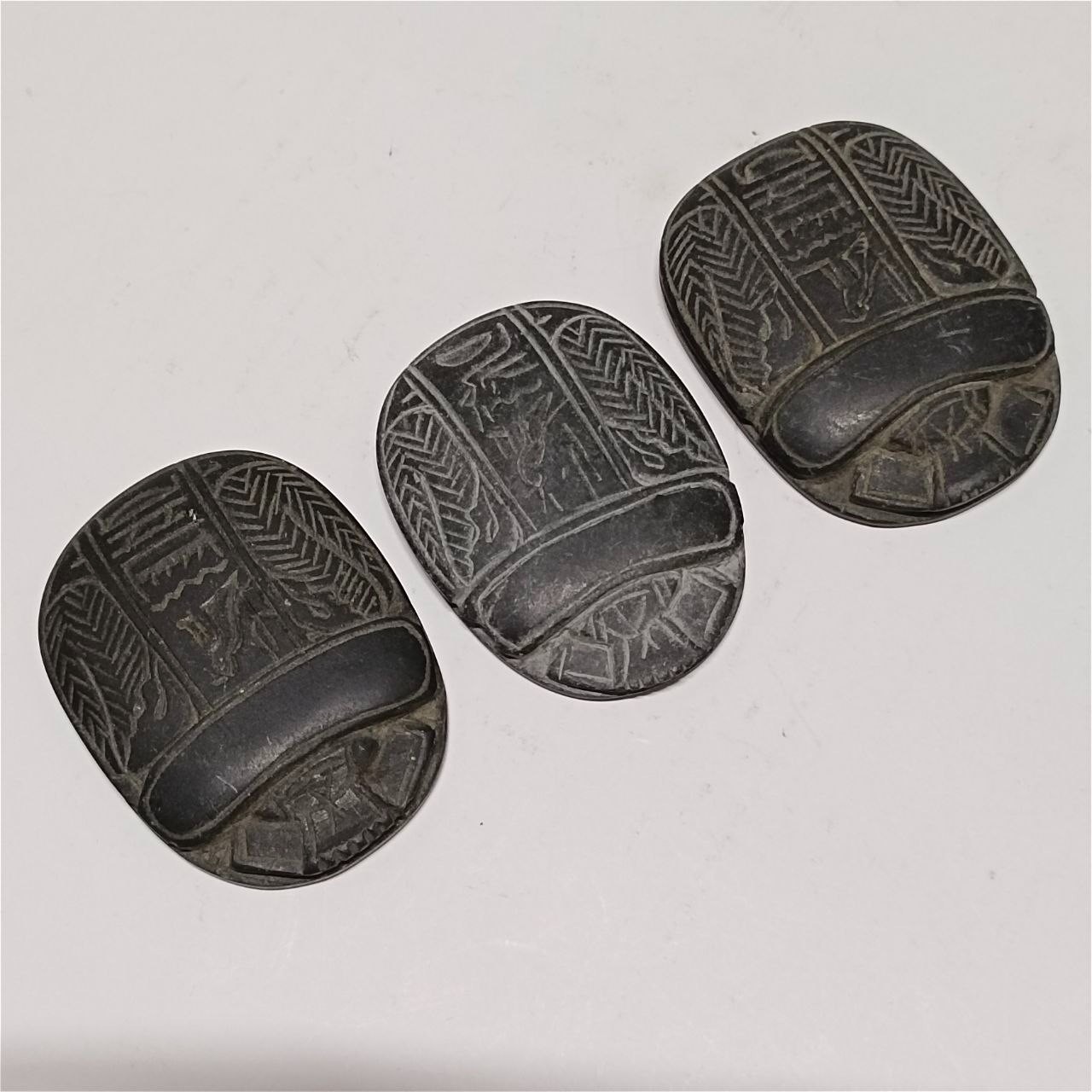 Ancient Egyptian inspired basalt scarab intricate carved hieroglyphic details