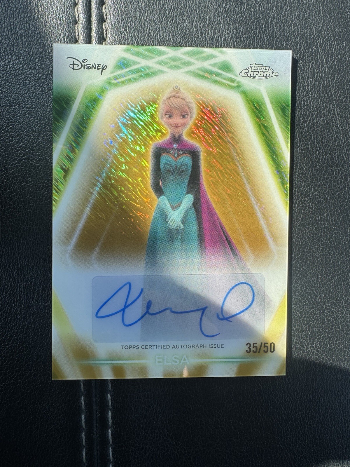 2026 Topps #CNA-IM Elsa Idina Menzel Gold /50 Chrome Neon Etch Auto Frozen