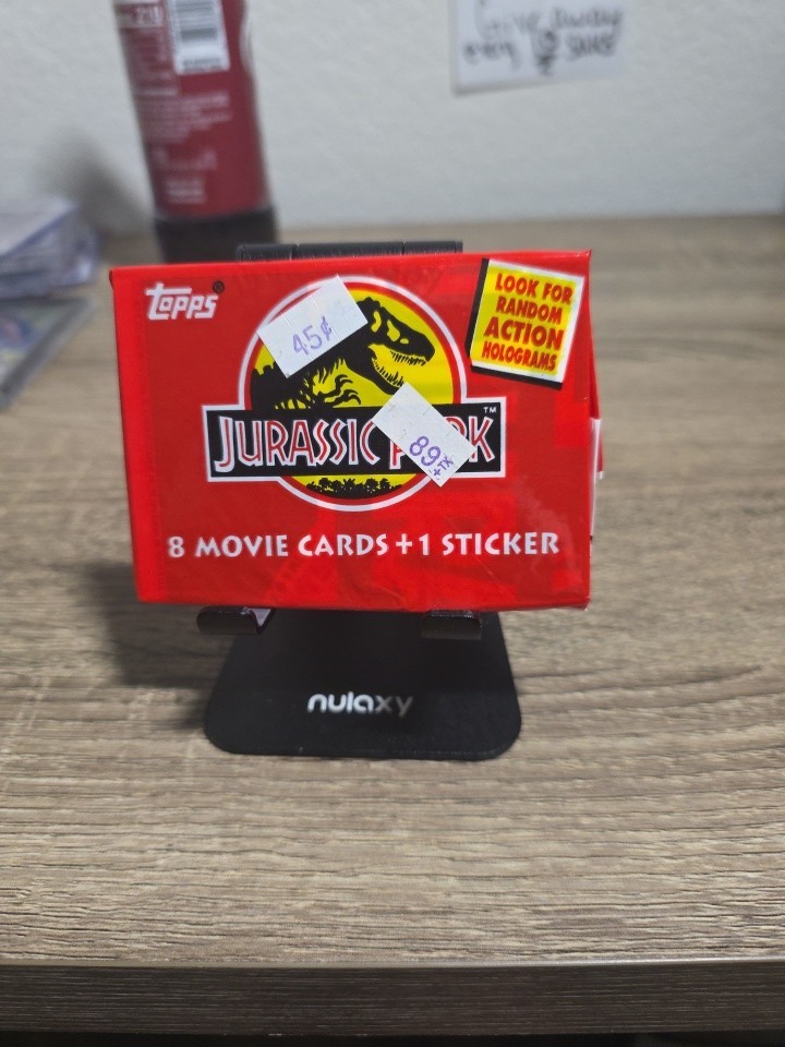 1993 Topps Jurassic Park Unopened Wax Pack 8 Movie Cards + 1 Sticker Sealed 1993 Topps Jurassic Park Unopened Wax Pack 8 Movie Cards + 1 Sticker Sealed