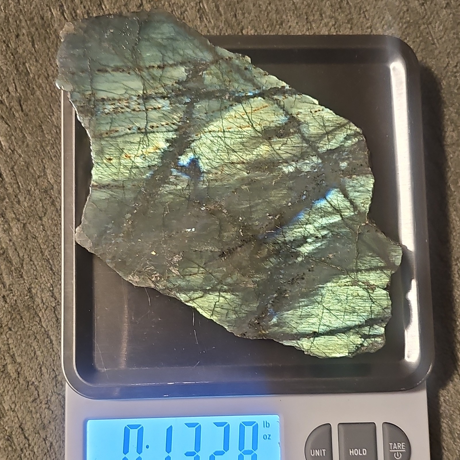 Glowing labradorite crystal / slab. Glows under sunlight. 