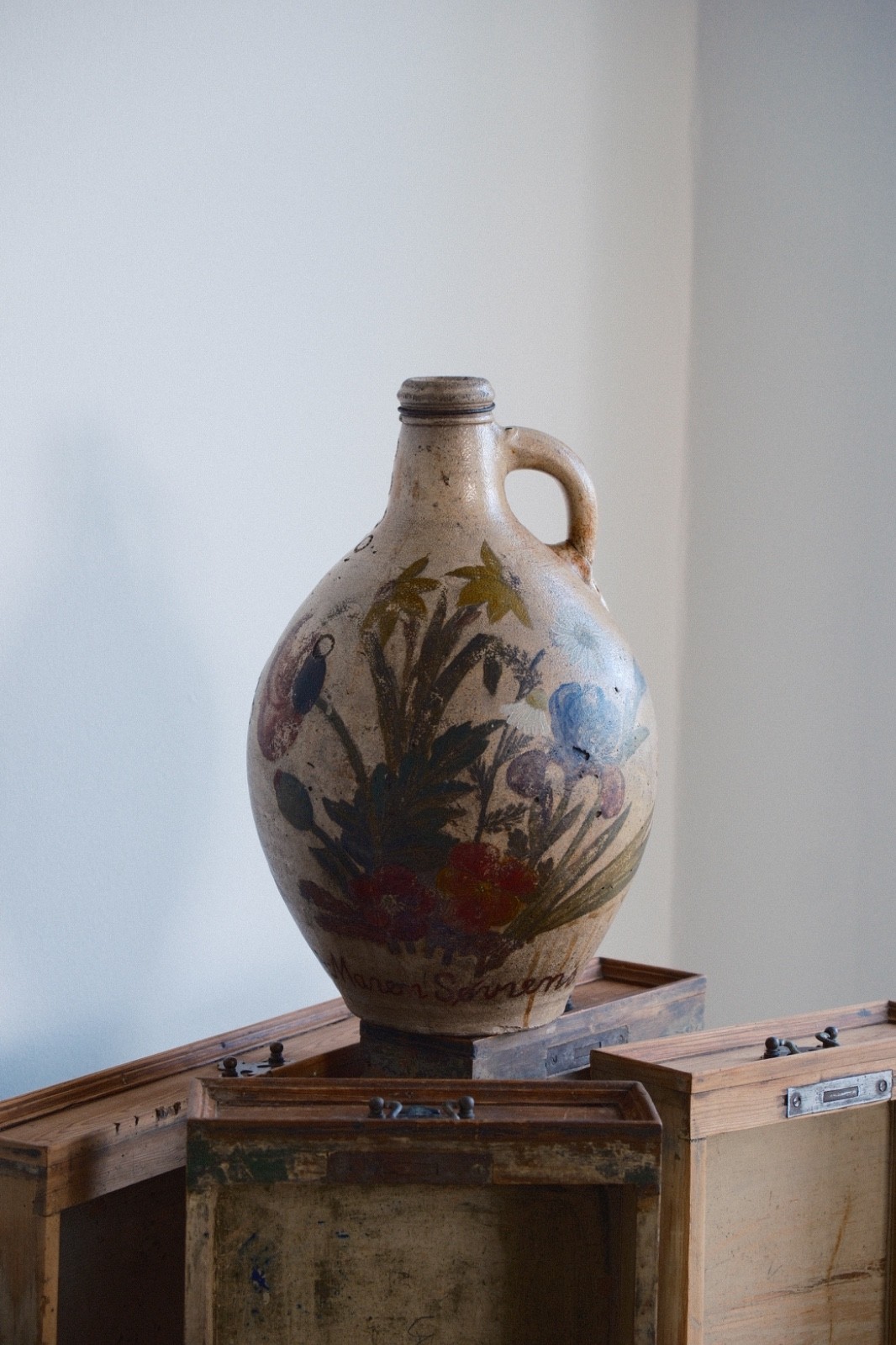 Mid 17th century large salt-glazed stoneware bottle with unusual floral motif