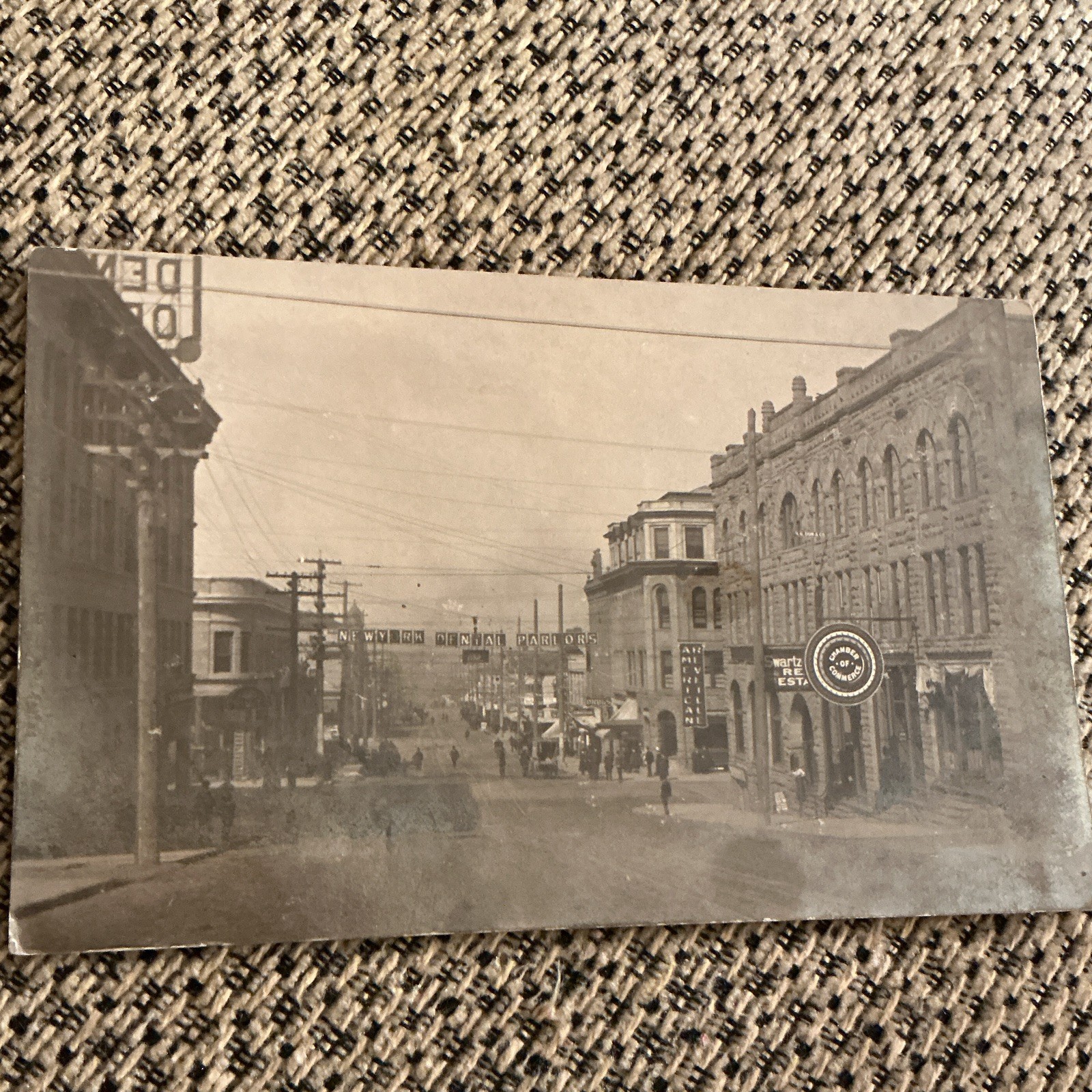 RPPC,Bellingham,WA,street scene,Dental Parlor bldg,Amer. Reveille newspr.,ca1920