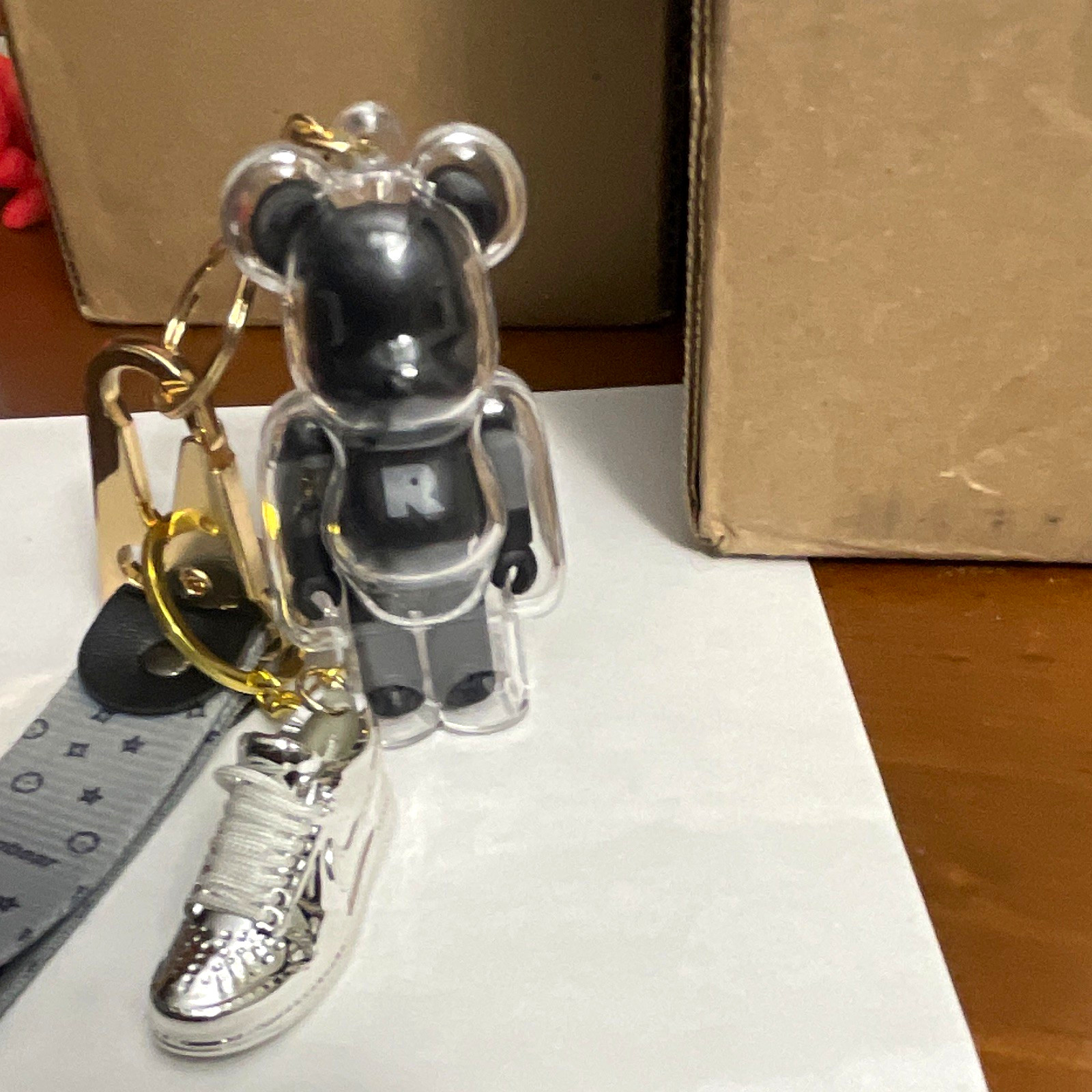Supbear Bearbrick Figure Keychain w/ Gray Strap, Silver/Gray Sneaker Charm, Clip