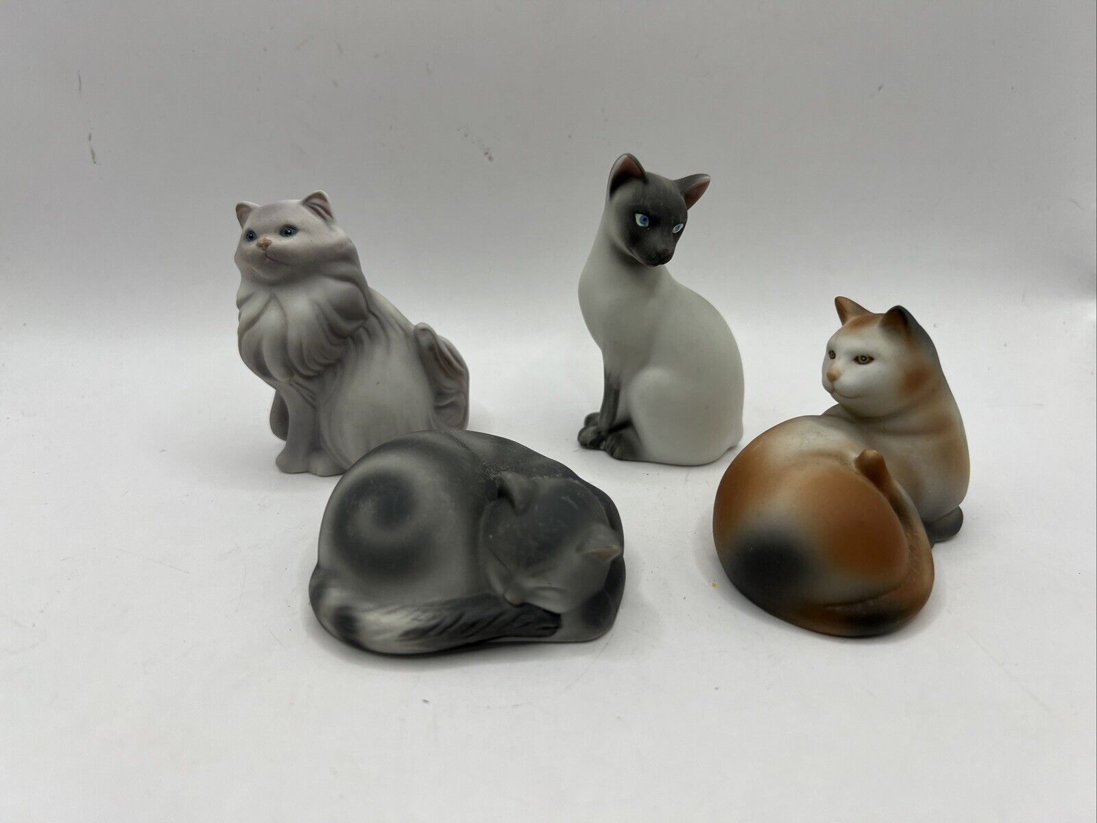 1984 Avon 4 Bisque Porcelain Cat Figurines Persian, Calico, Tabby & Siamese Cats