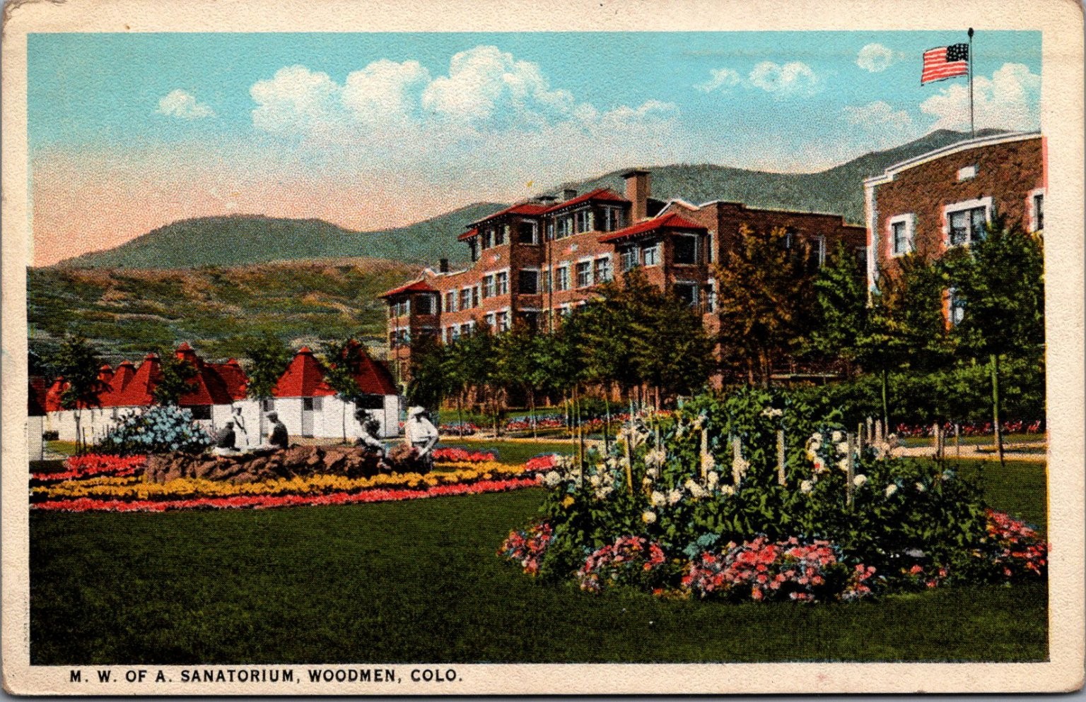 1929 Woodmen, CO Postcard M.W. of A. Sanatorium, Mountains & Flowers
