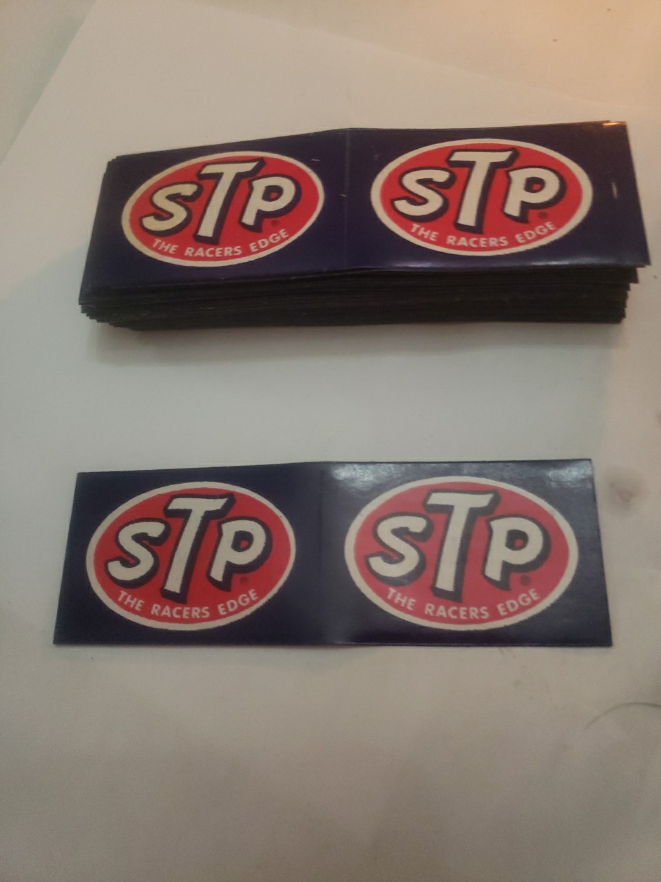 (2) Vintage STP “The Racer’s Edge” Paper-Backed Stickers  - Small 1.5 X 2.25