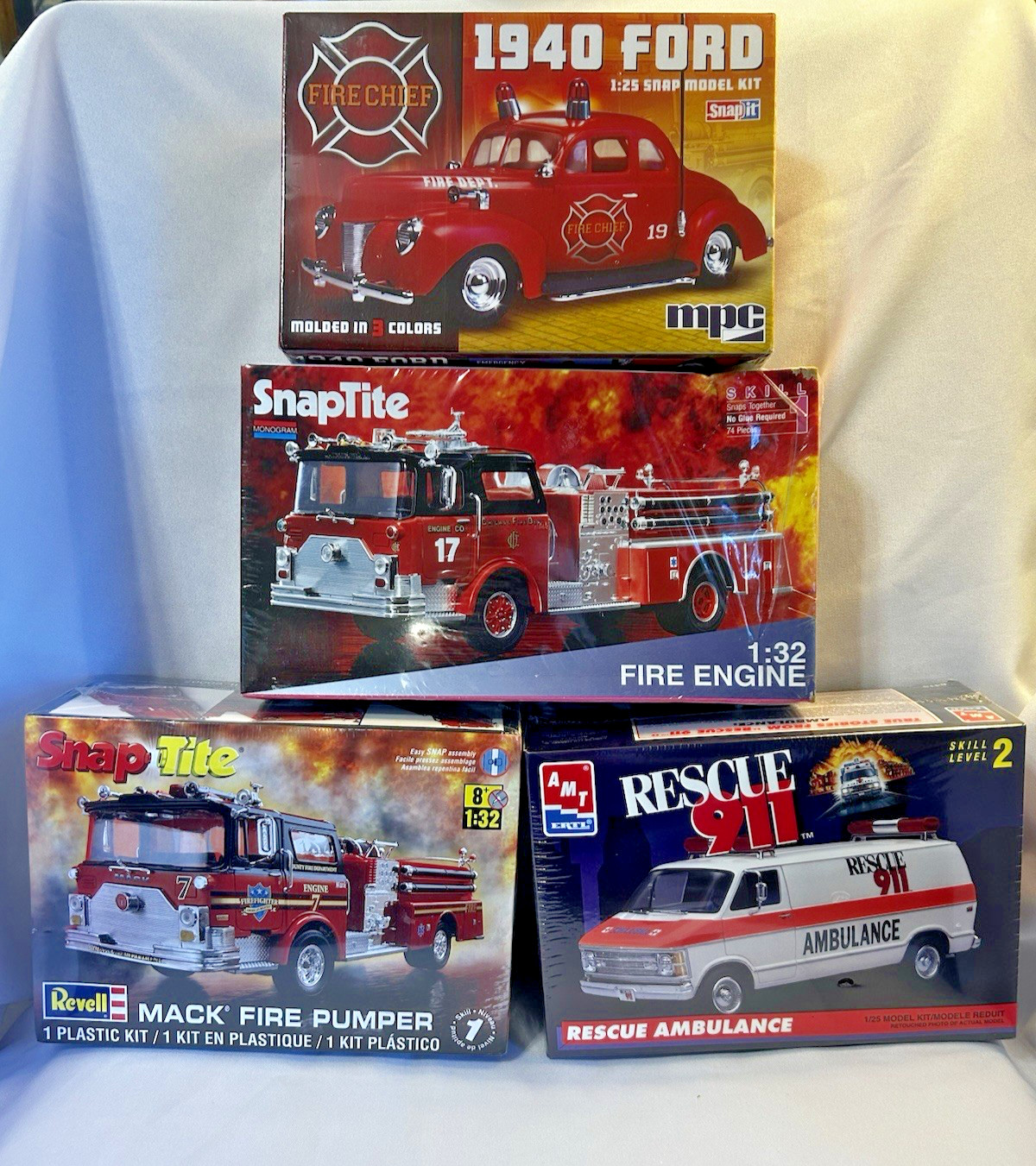 Lot of (4) Fire Dept.model kits, Engines,Chief,Ambulance NEW FACTORY SEALED BOXs