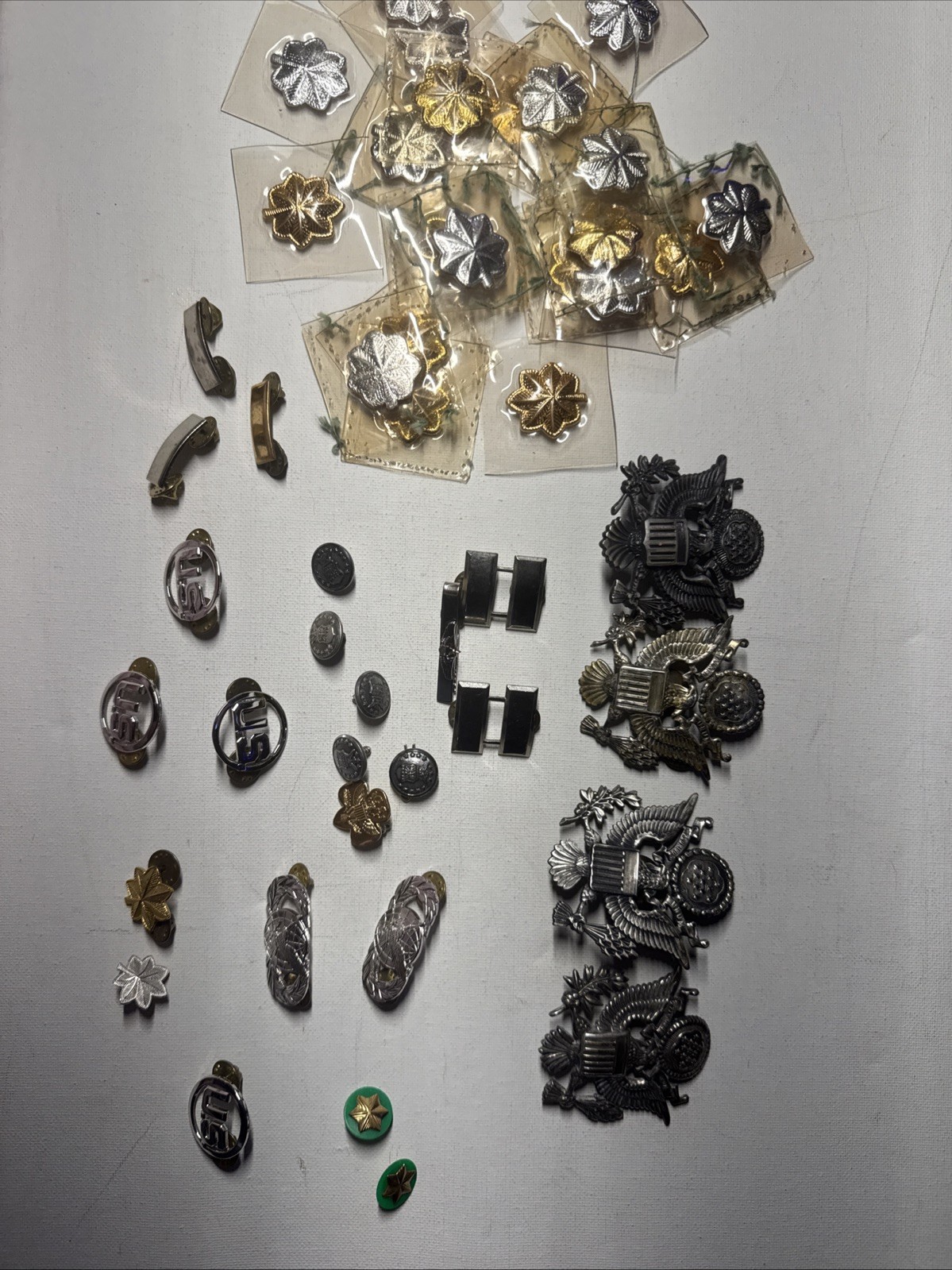 Huge US Military Insignia Lot - Officer Cap Eagles Captain Bars Oak Leaf Pins