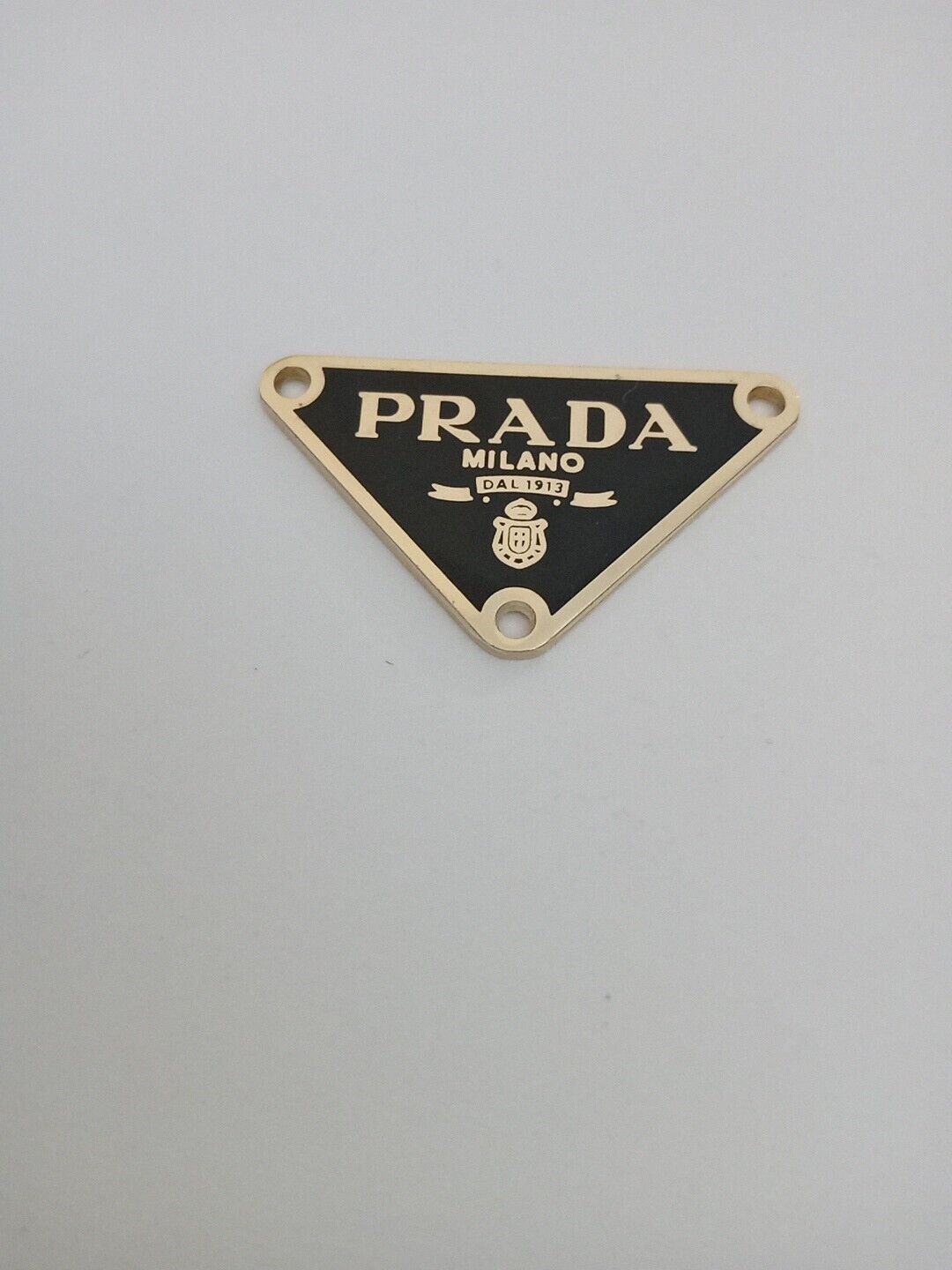 One 38mm Prada Logo Triangle with trim Gold tone Button  Zipperpull