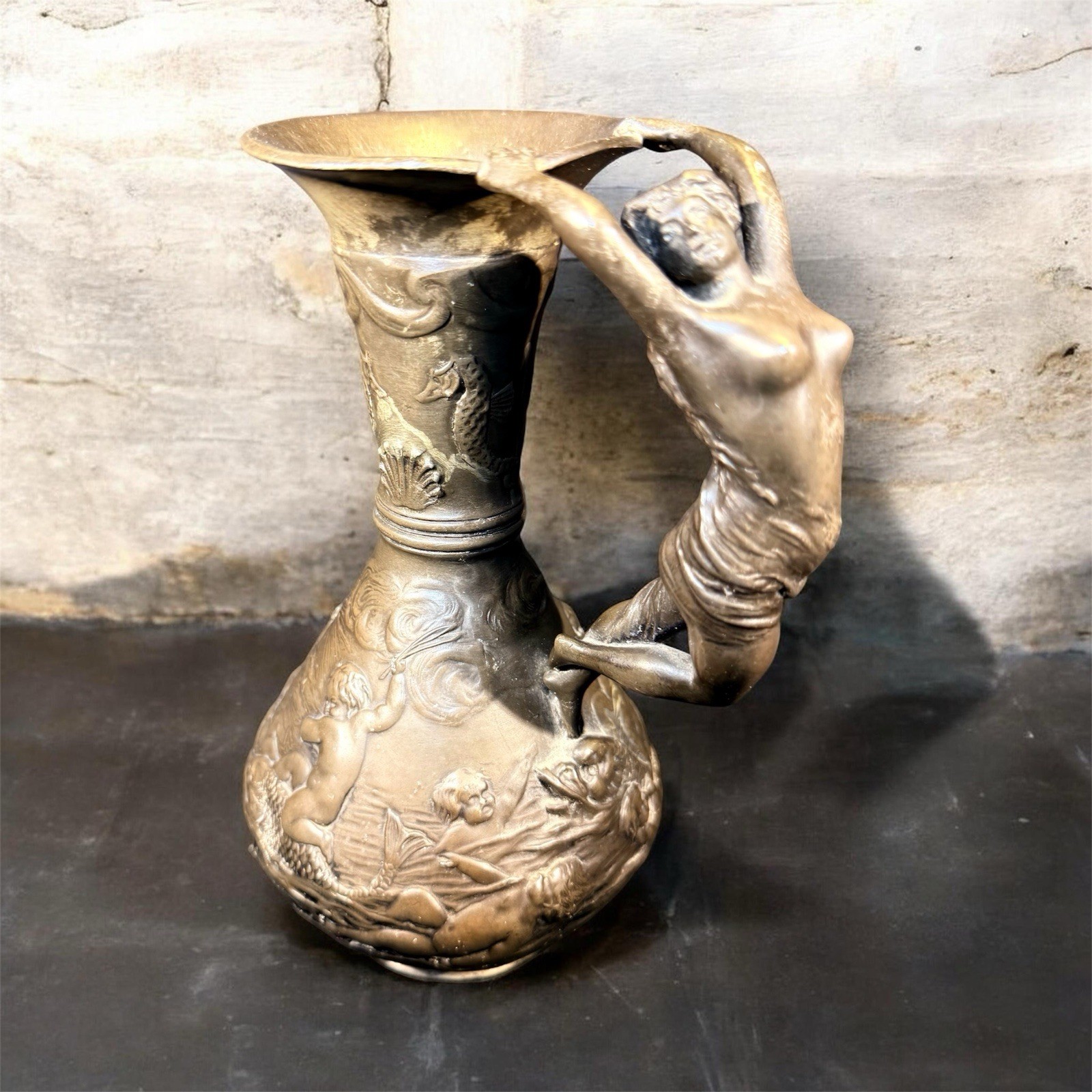 Bronze-finished metal ewer with figural female handle in Art Nouveau style, Bronze-finished metal ewer with figural female handle in Art Nouveau style,