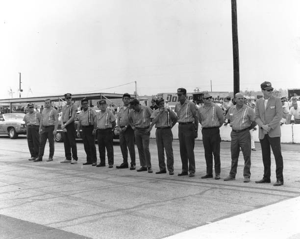 Race officials line pit road prior to race time Historic 1960s Old Photo