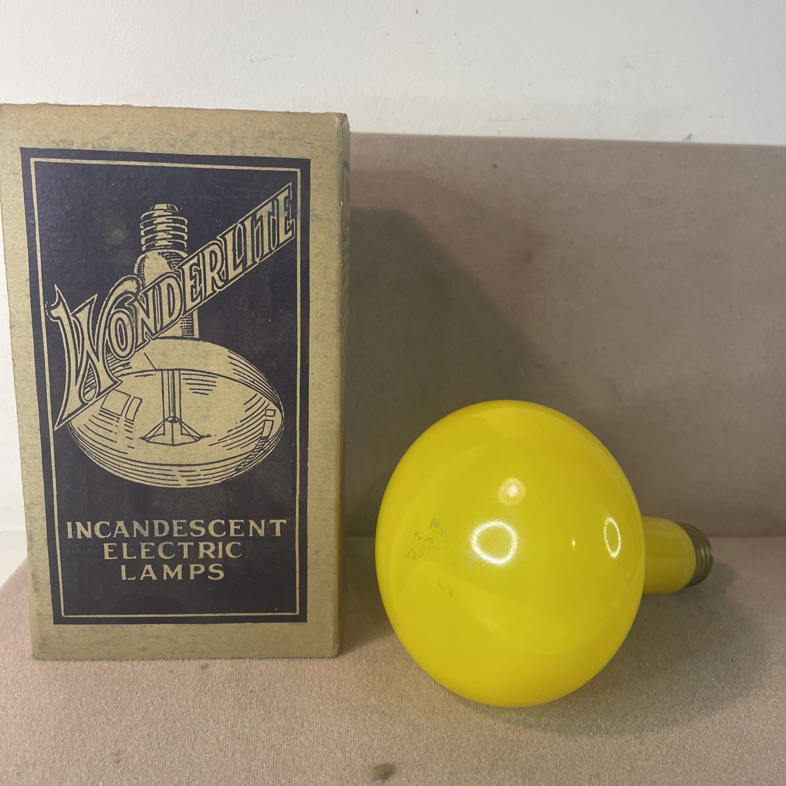 Vintage 1940’s / 50’s yellow 75 watt with sleeve light bulb Works Studio Light