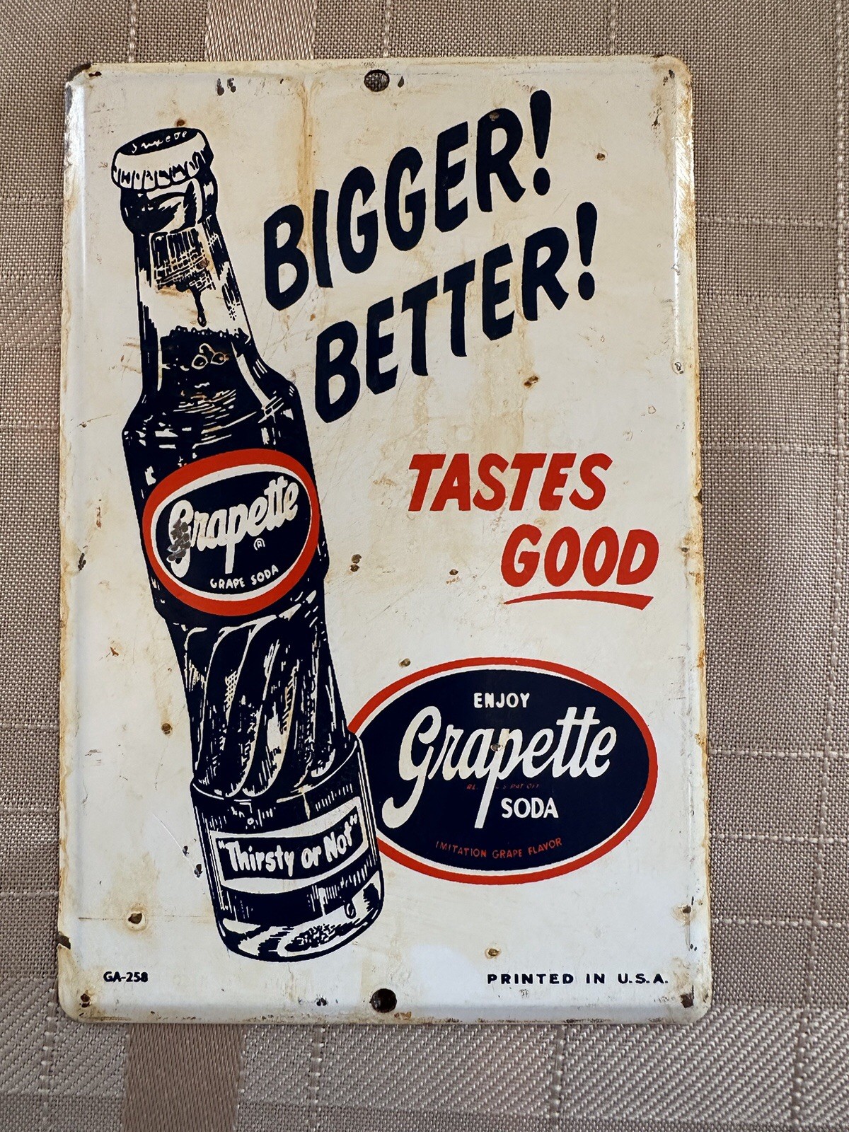 Grapette Bigger Better Soda Pop Stamped Printed Metal Advertising Sign
