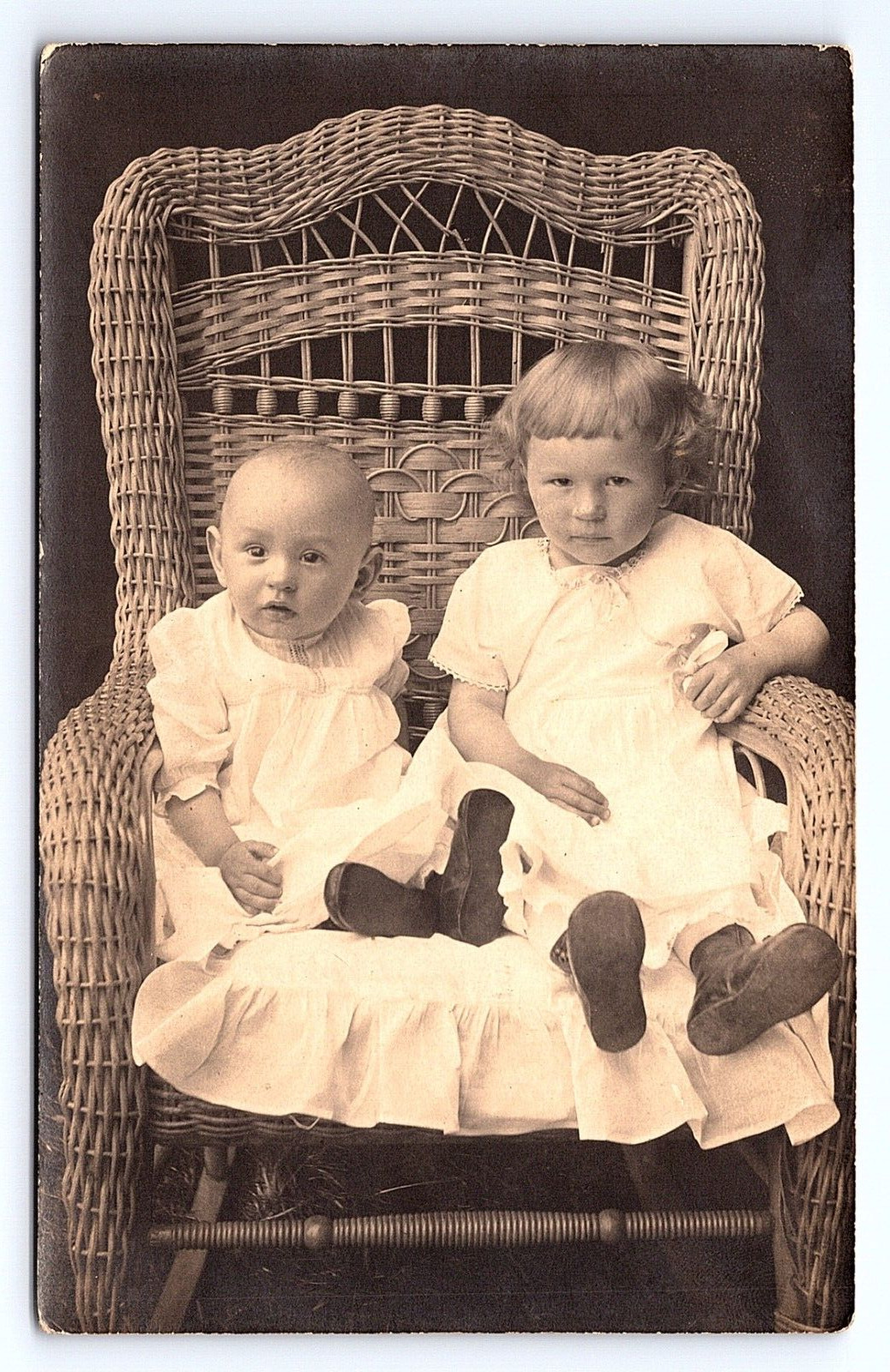 Postcard RPPC Two Cordeck Children Posed Wicker Chair