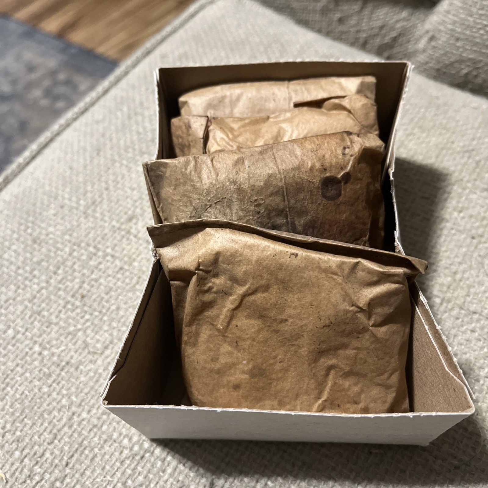 4 packs of WW2 D-Day cleaning patches in waterproofed paper envelope.