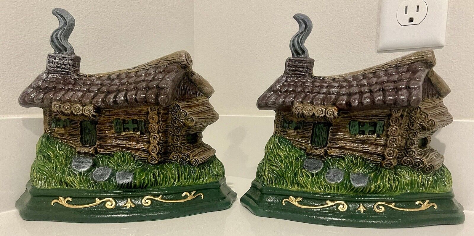 Lot Of 2 Painted Cast Iron Doorstop/Bookends Depicting a Lovely Lil Cottage