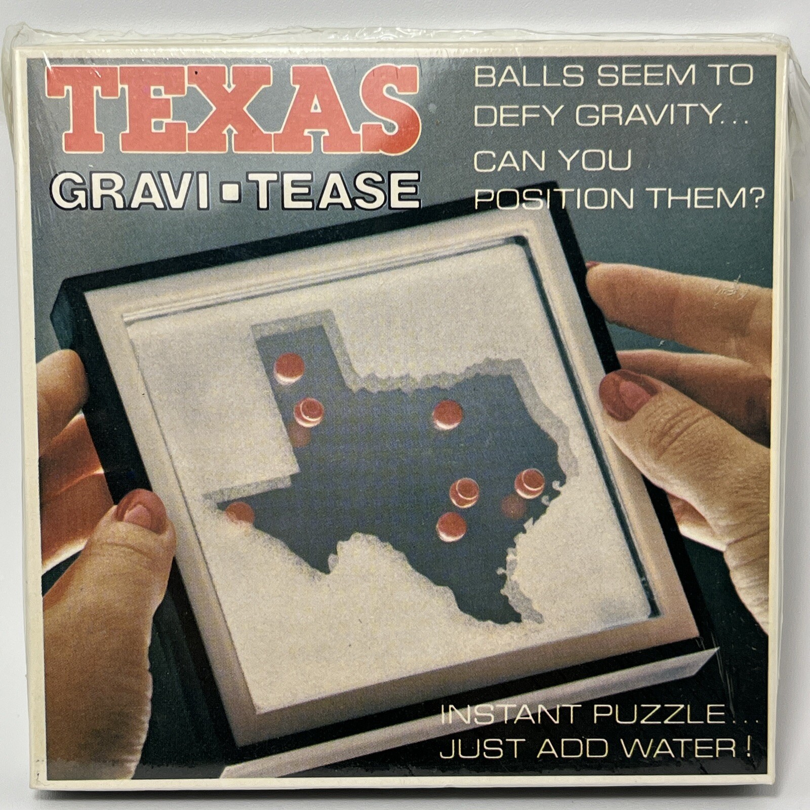 Texas Gravi Tease Sealed just add water 1980 Gravi-tease Gravity Puzzle Vintage