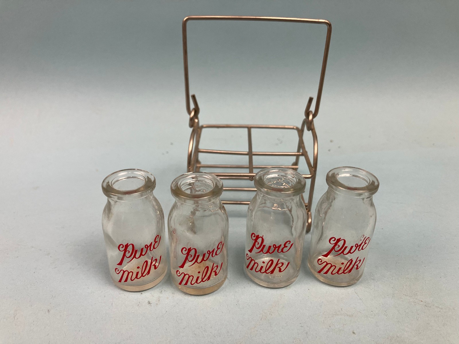 Vintage miniature milk bottles and carrier, Bottles are 1\