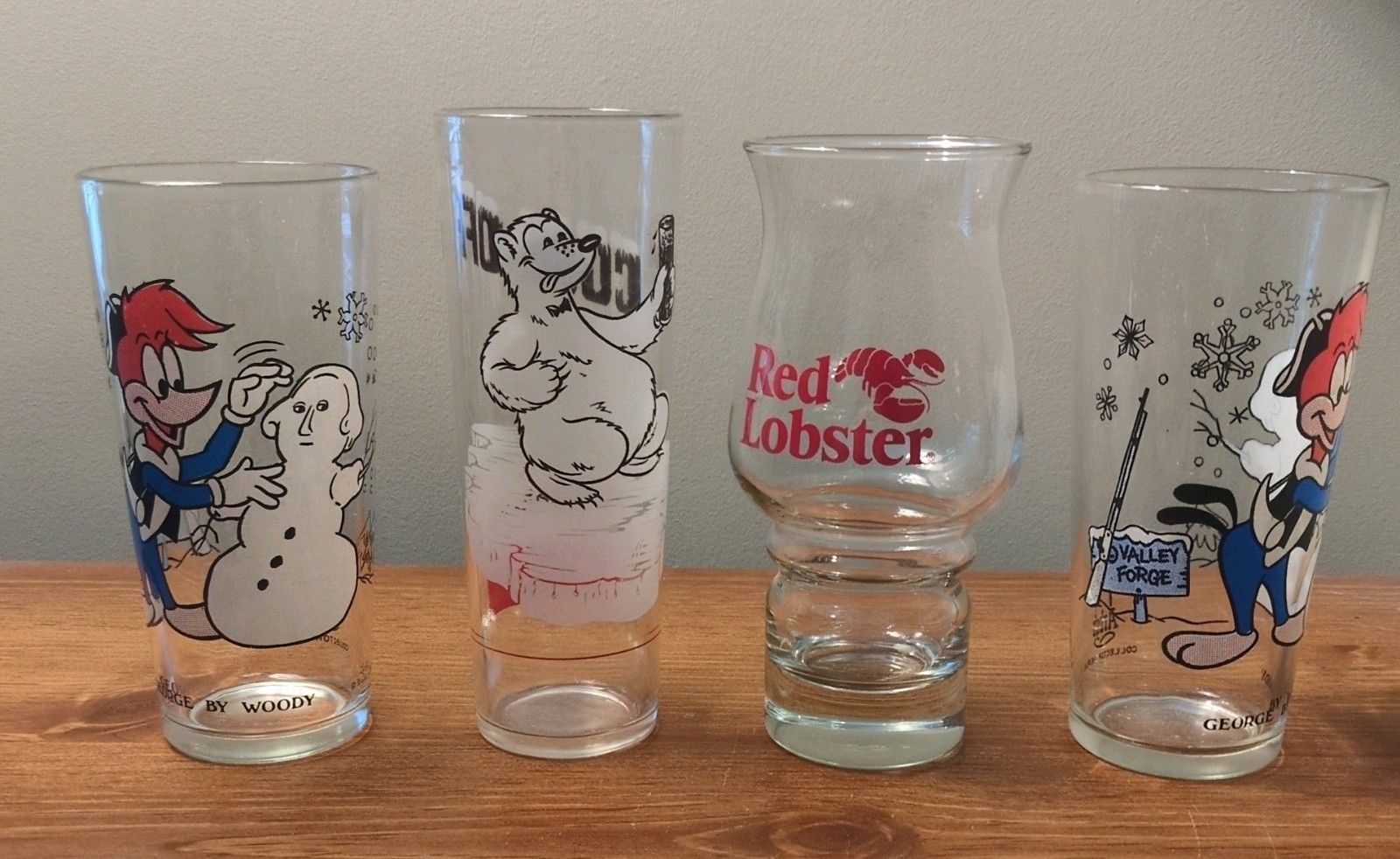 Four vintage promo glasses  1 Red Lobster 2 Arby's Woody Woodpecker & Polar Bear