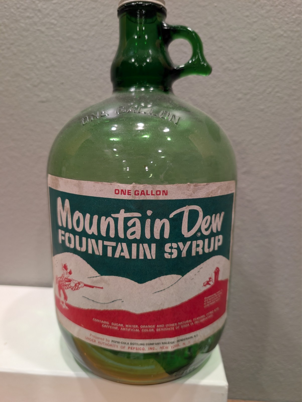 MOUNTAIN DEW SODA FOUNTAIN SYRUP PAPER LABEL 1 GALLON JUG GREEN GLASS HILLBILLY