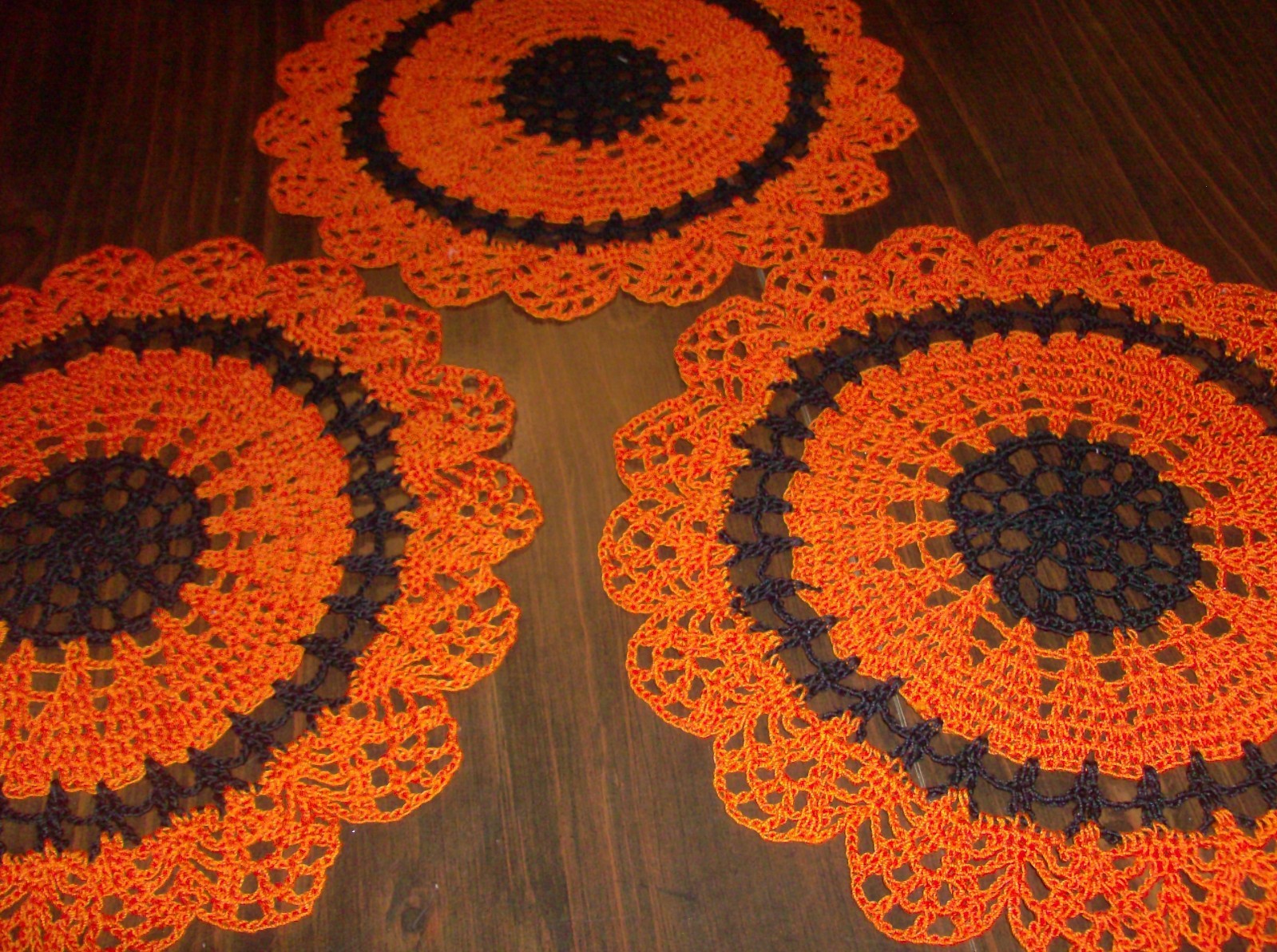3 ORANGE AND BLACK 10 1/2 INCH HALLOWEEN OR FALL DECOR DOILIES NEW/HANDMADE 3 ORANGE AND BLACK 10 1/2 INCH HALLOWEEN OR FALL DECOR DOILIES NEW/HANDMADE