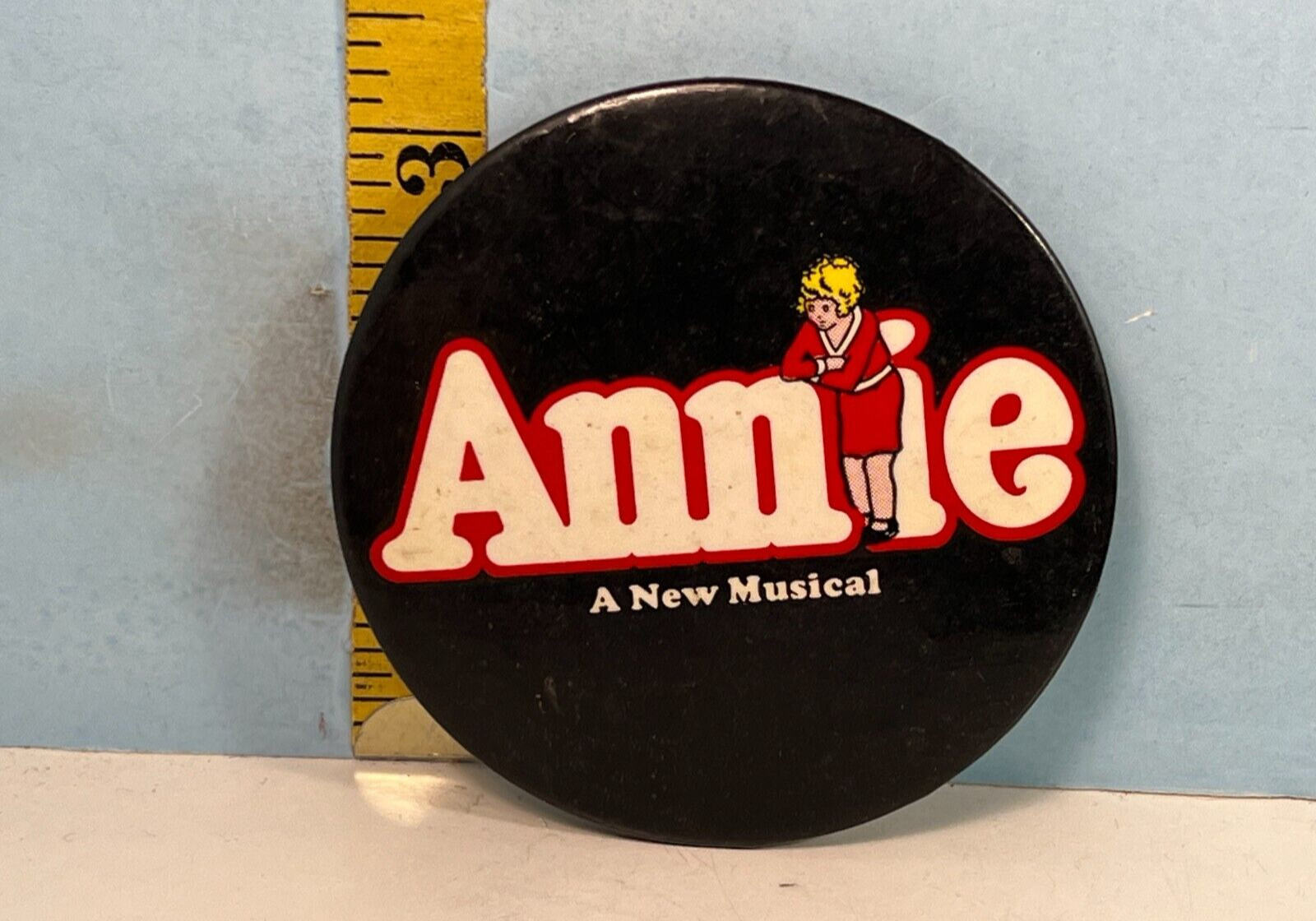 Vintage ANNIE A New Musical Pinback Button 3-1/4\