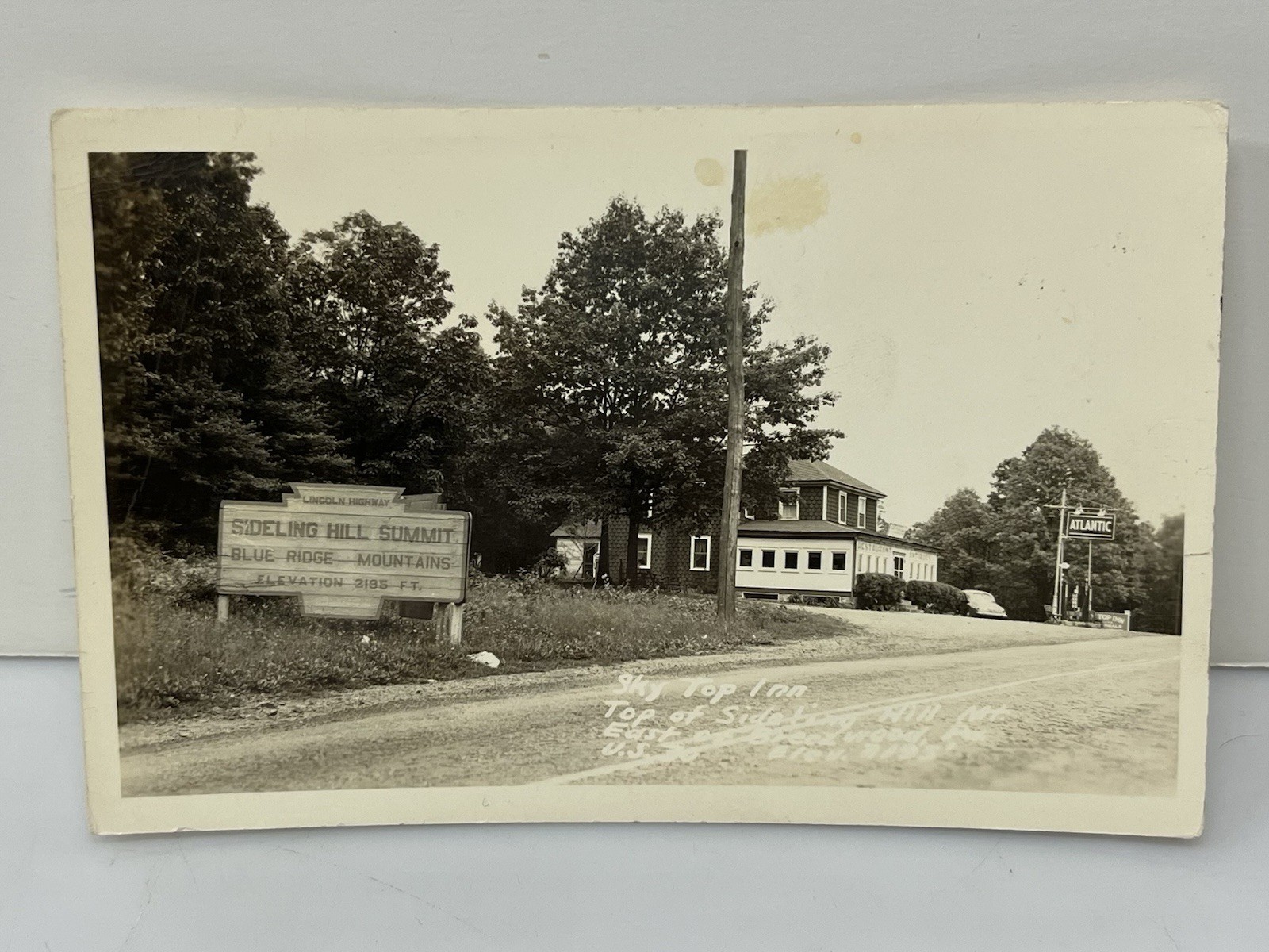 RPPC Sky Top Inn Sideling Hill Summit Breezewood Postcard Atlantic Gas Station