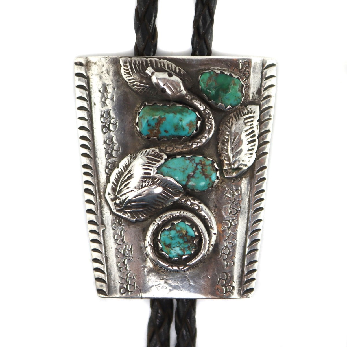 Attributed to Dan Simplicio Zuni Turquoise and Silver Bolo Tie with Snake Design Attributed to Dan Simplicio Zuni Turquoise and Silver Bolo Tie with Snake Design