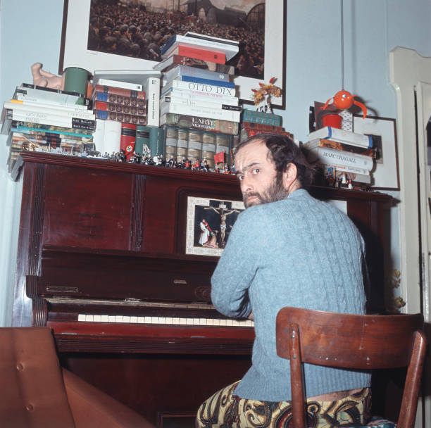 Italian singer songwriter and musician Lucio Dalla sitting at the - 1967 Photo