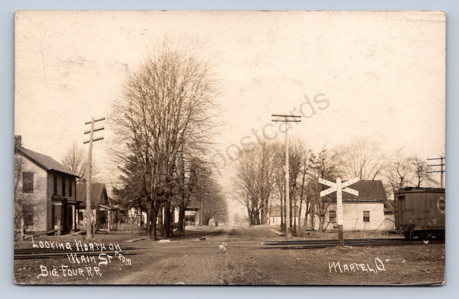J87/ Martel Ohio RPPC Postcard c1910 Main Street Homes Big 4 Railroad  595