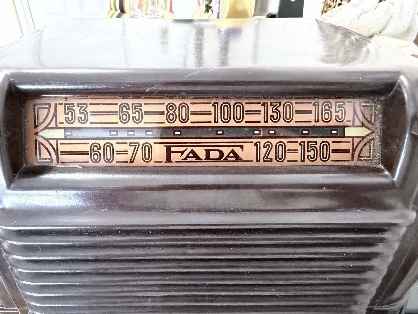 The item pictured is a vintage FADA Model 605 AM tube table radio, manufactured
