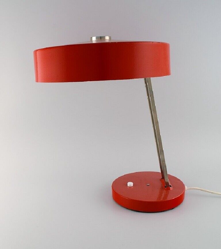 Large adjustable desk lamp in original red lacquer. 1970's. 