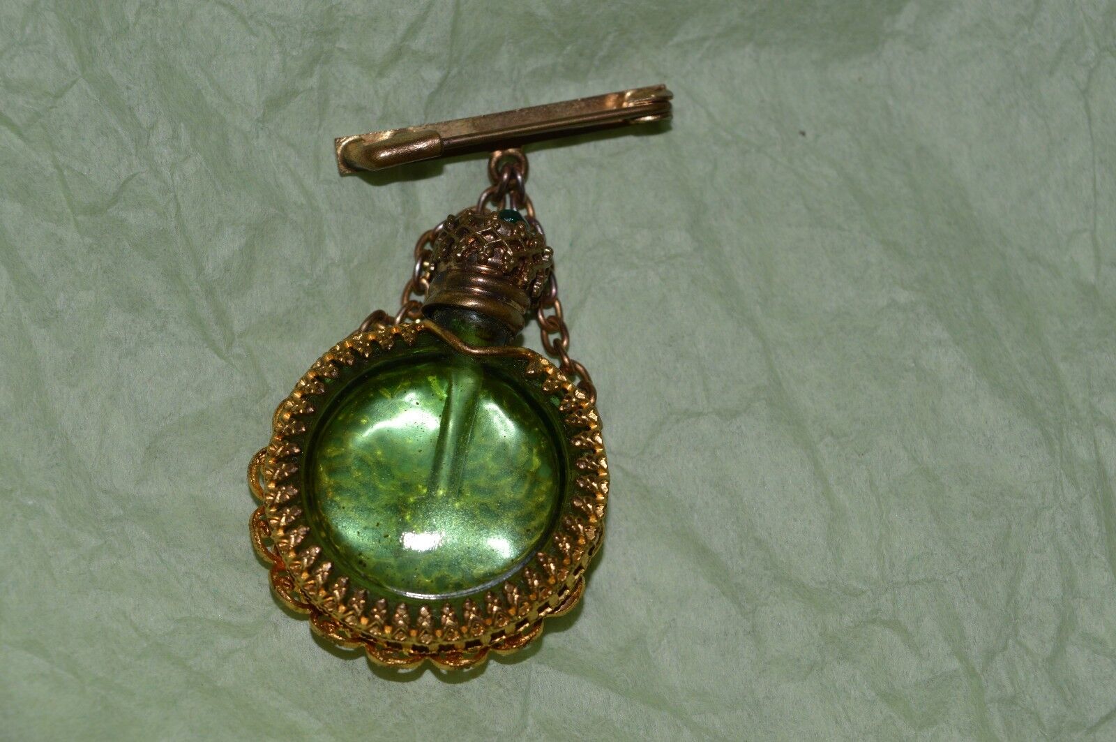 Antique Filigree perfume bottle gold filigree with green stone top & glass