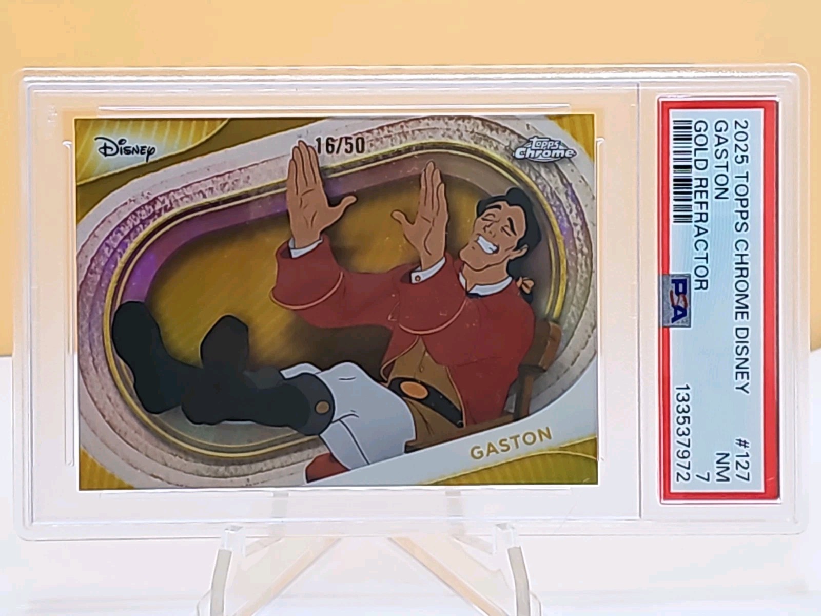 2025 Topps Chrome Disney Gaston Gold Refractor 16/50 PSA 7 #127
