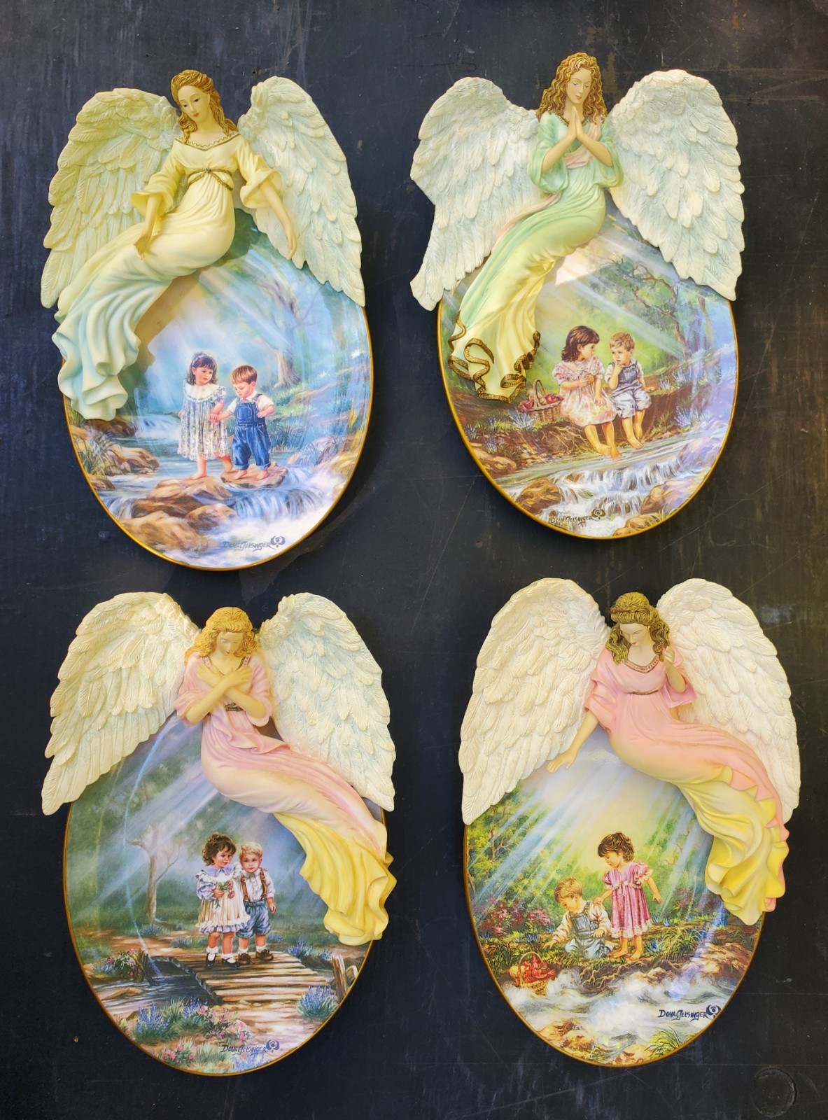 Set Of 4 Donna Gelsinger Wall Hanging Plate Figurines