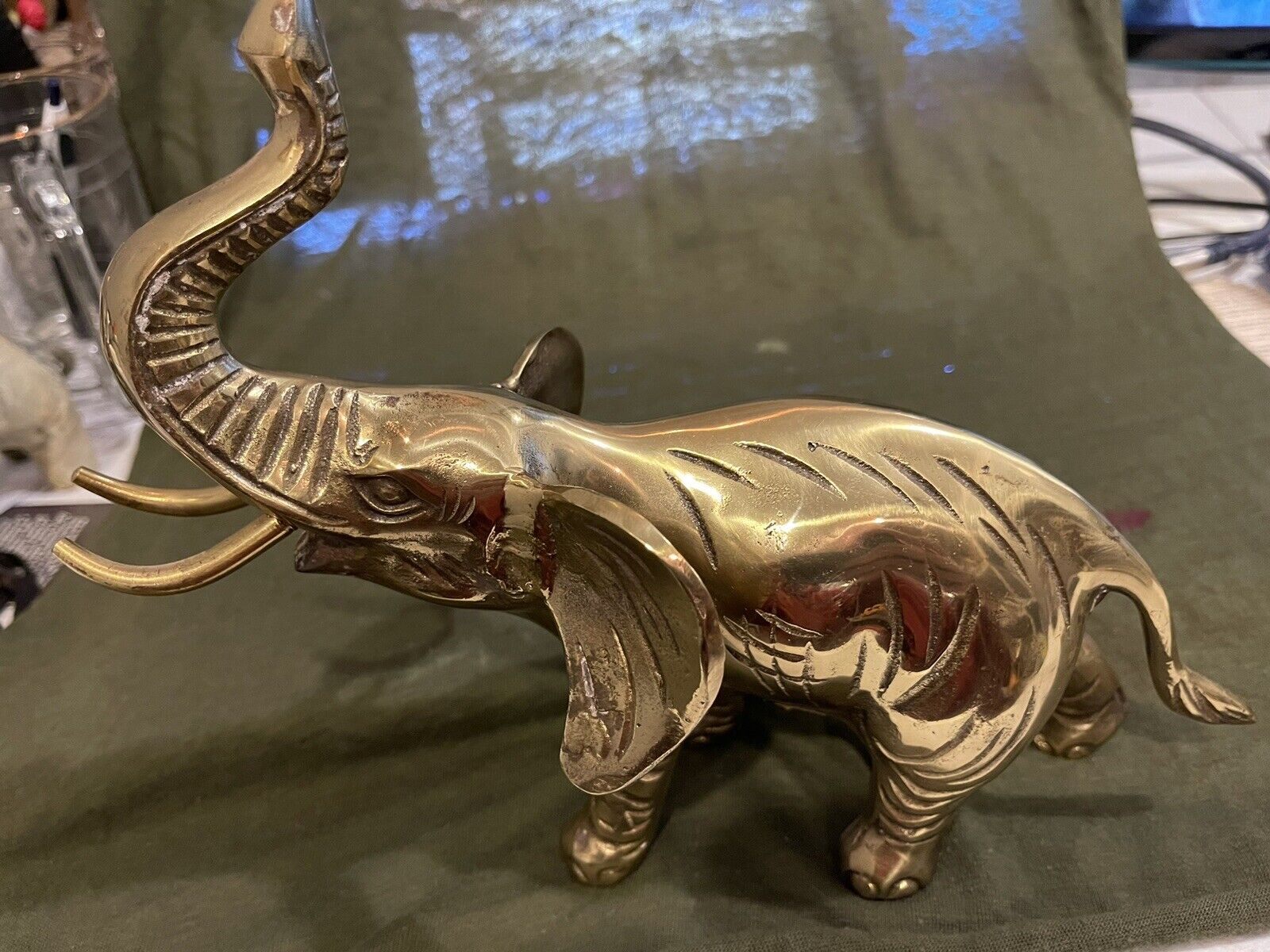 Vintage/undated T.H.C. lacquered solid brass Elephant.  8in tall, 10in long.