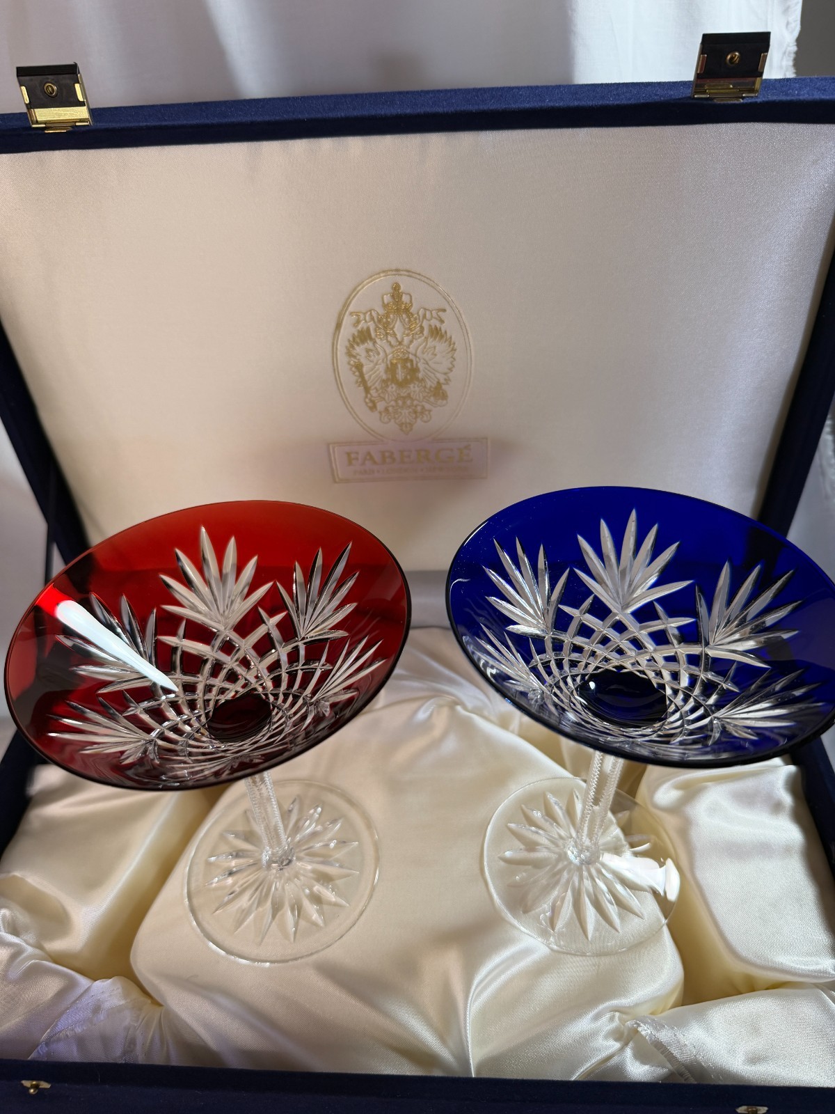Faberge Odessa Cut to clear red/blue martini set in presentation box