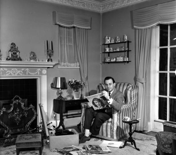 England Disc Jockey David Jacobs pictured looking through record c- Old Photo 2