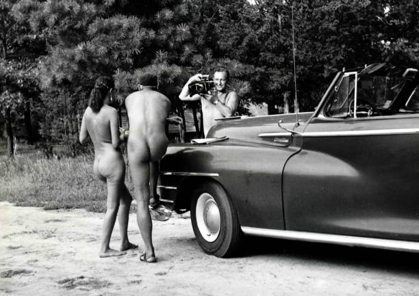 Classic Collection Page 81 Nudists having picture taken by car May- Old Photo