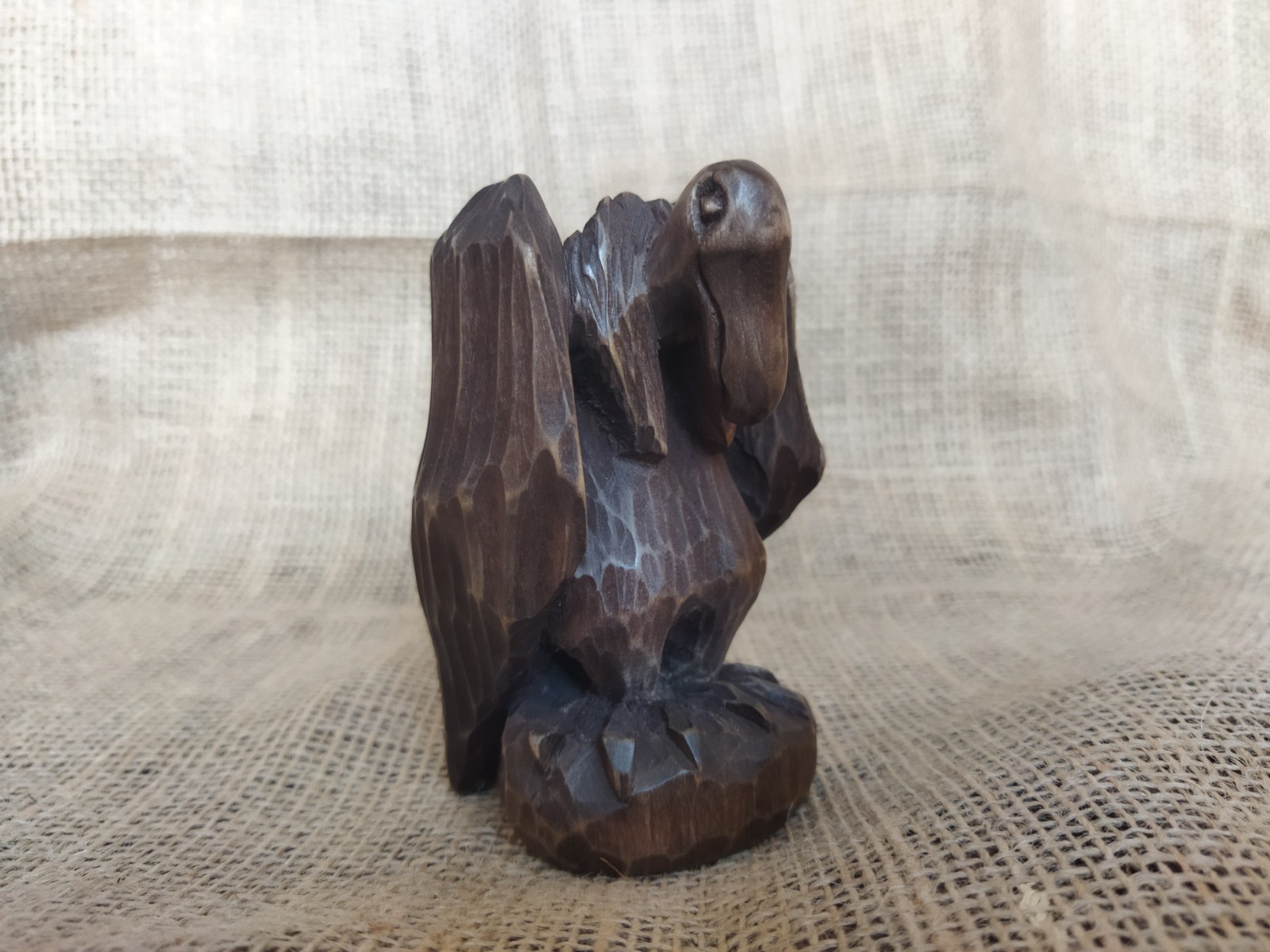 Vulture statue. Vulture, the guardian of the wild – handcrafted wooden sculpture