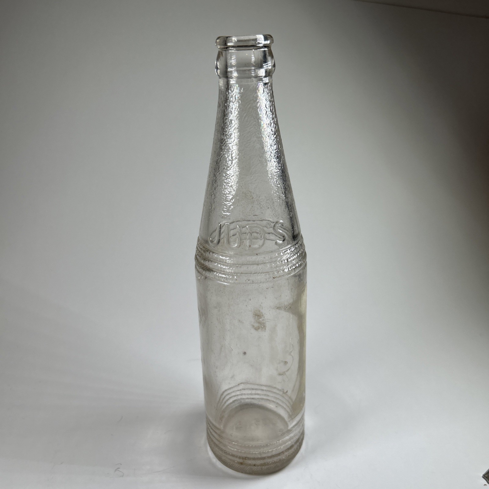 Vintage Jud’s Beverages Bottle, Clear Glass, Embossed Vintage Jud’s Beverages Bottle, Clear Glass, Embossed