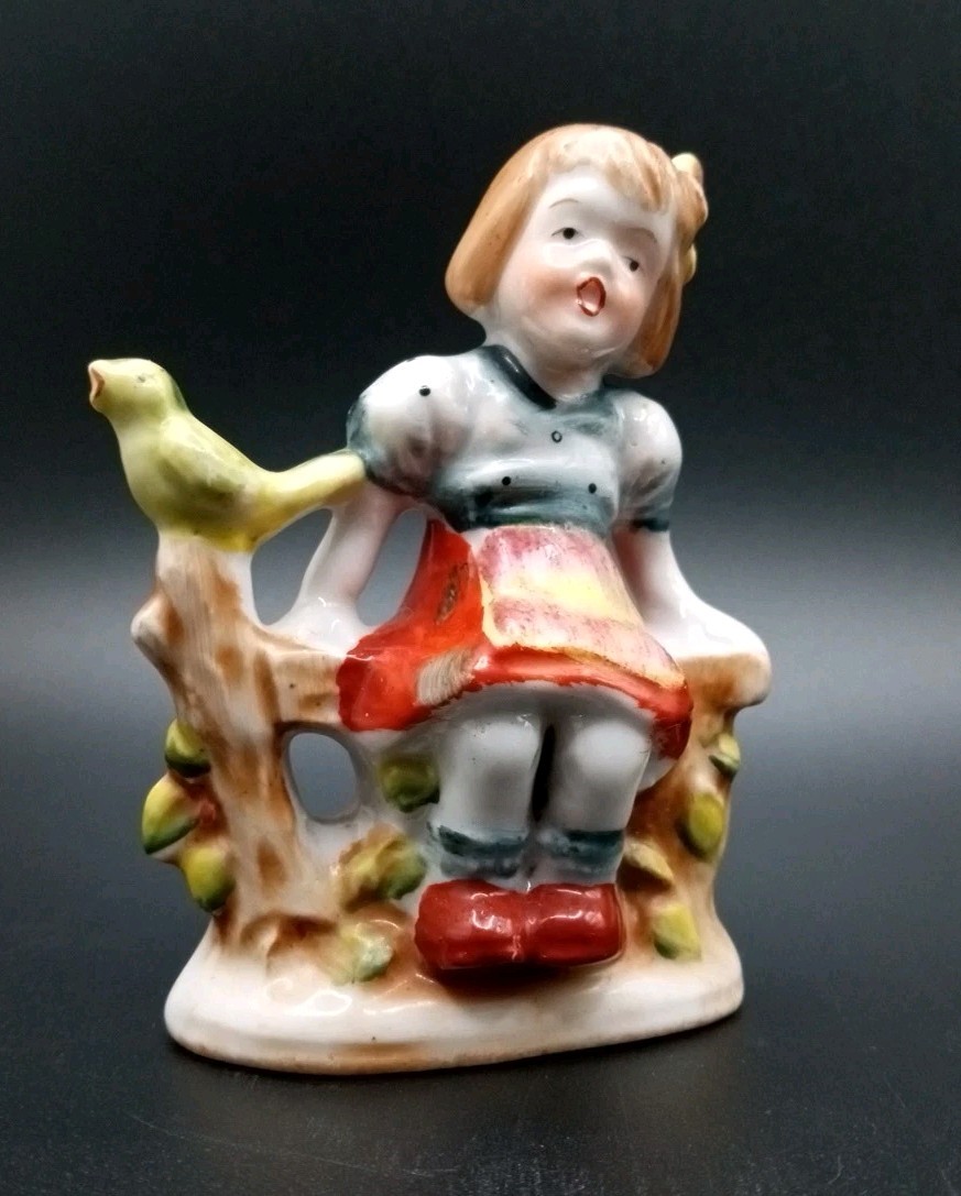 Vintage Made In Occupied Japan Porcelain Figurine Girl on Fence with Bird