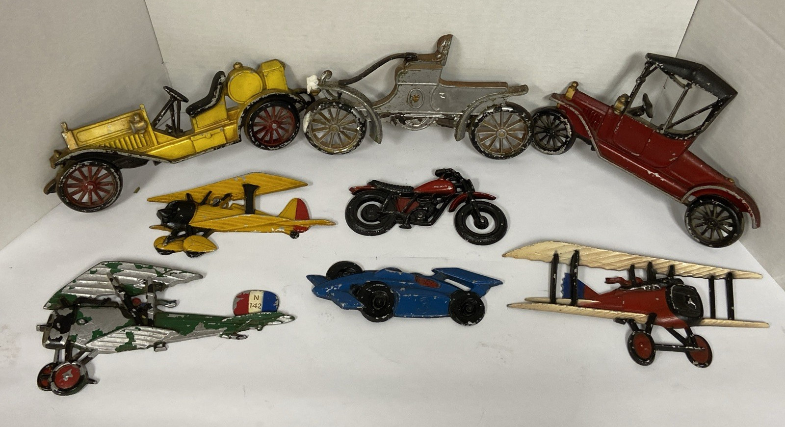 vintage homco and sexton cast wall art-8 pieces,planes,cars motorcycles