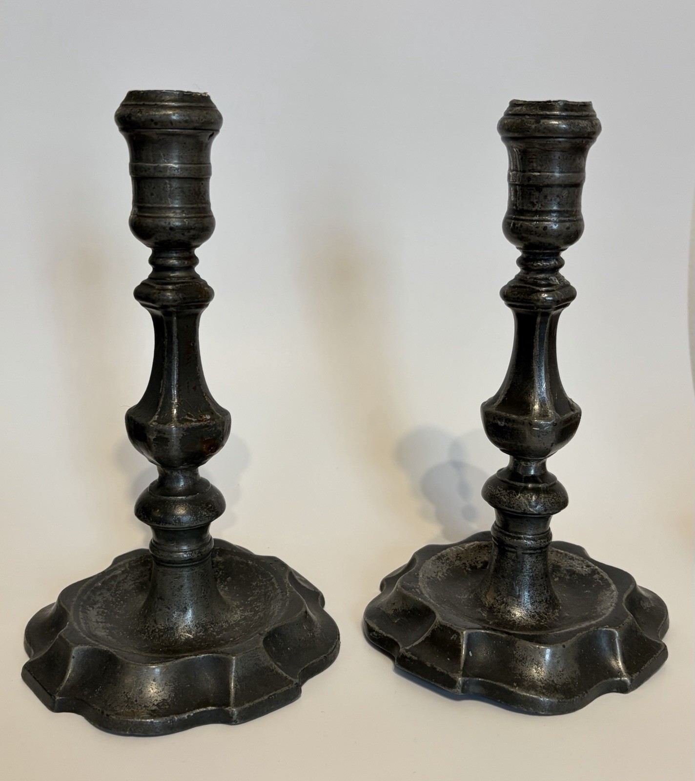 Antique pair of 18th c. pewter candlesticks dated 1777, with monogram “IW”