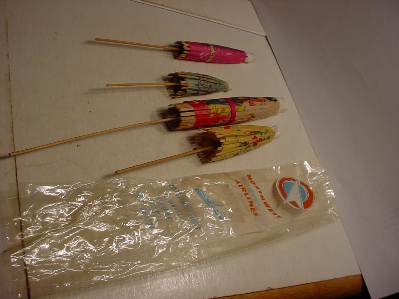 4 vintage miniature advertising Northwest Orient Airlines drink UMBRELLAS