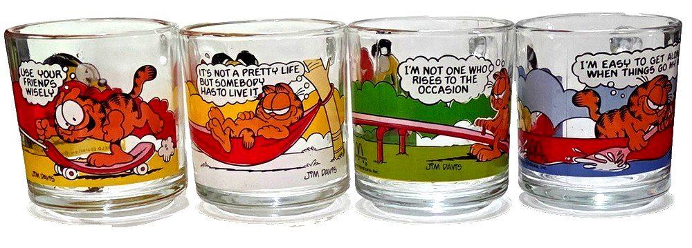 Here is a Group of 4 Garfield McDonalds Painted Glass Mugs, dated 1978