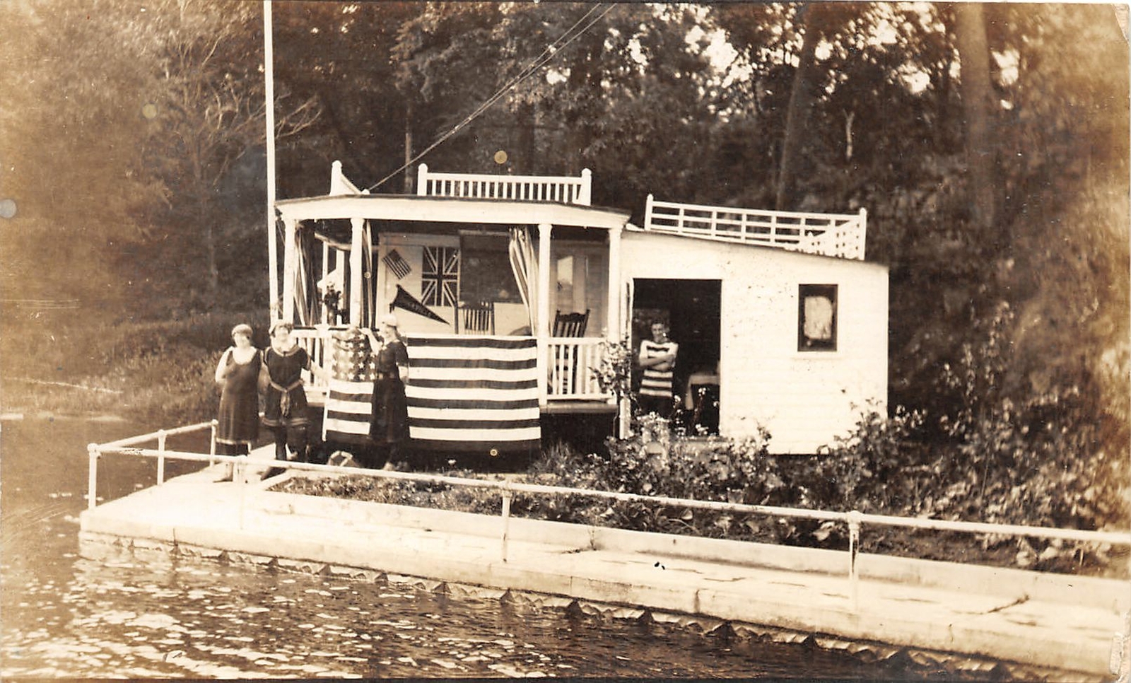 H77/ Interesting RPPC Postcard c1910 Patriotic Flag Indiana? Lake Cottage 140