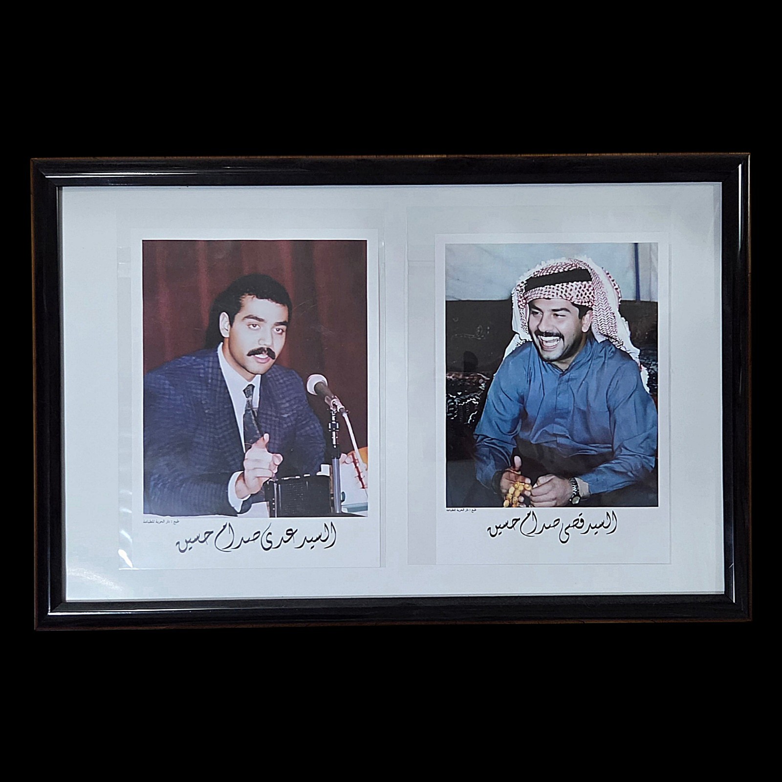 Iraqi Portraits Uday and Qusay in display frame Iraq