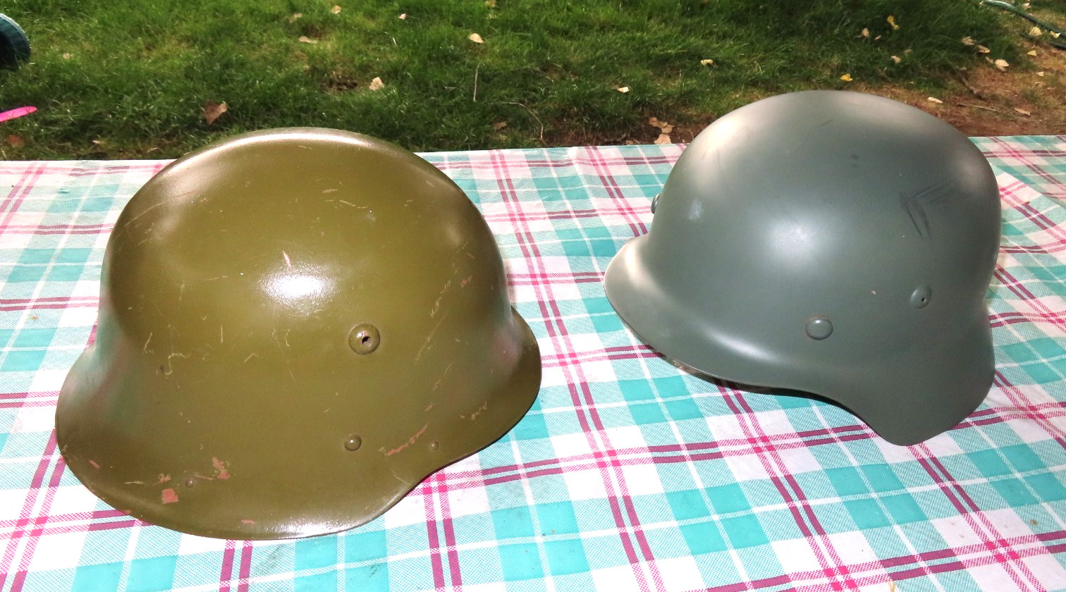 Set of two German WW II  Steel Helmets with Leather Liner