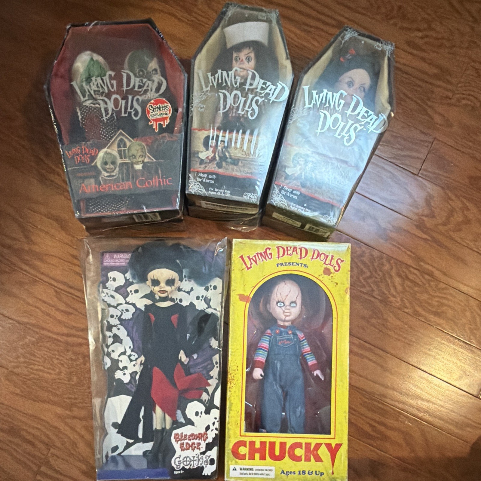Living Dead Dolls Lot: Chucky, American Gothic, Rotten Son & Sandy Living Dead Dolls Lot: Chucky, American Gothic, Rotten Son & Sandy
